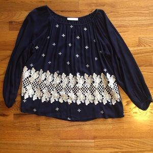 Navy Entro blouse size S with off whiteish flowers
